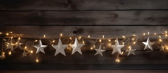 Fototapete - A festive background featuring Christmas stars and decorations on a wooden backdrop Perfect for a Christmas or New Year greeting card Copy space image