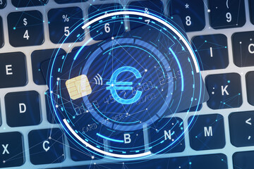 Canvas Print - Close up of laptop keyboard and bank card with glowing round euro hologram with polygonal mesh and bokeh circles on blurry blue background. Digital banking and finance concept. Double exposure.