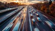© Irina Ukrainets - Busy Highway at Sunset with Blurred Car Lights, Rush Hour Traffic in Motion. Urban Transportation Concept. Photographed in the Evening. AI