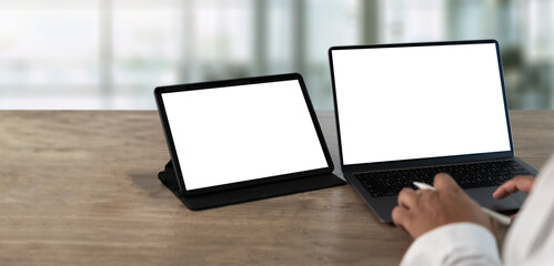 Poster - laptop with blank screen on table. workspace background new project on laptop computer with blank co