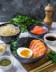 salmon and vegetables, ingredientes ramen tradicional japones fondo blanco, huevos salmón tallarines alga nori langostino y verduras frescas, sopa de miso con fideos