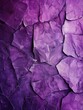 Close-up of purple painted rocks with a textured finish and subtle color variations.