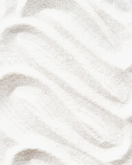 Background of white sugar with a textured, curly appearance. Food Background.