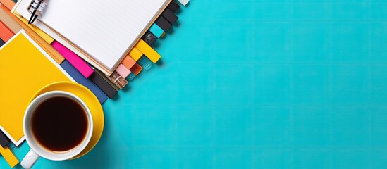 Aufkleber - Top view of a coffee cup surrounded by copybooks on a colorful background perfect for incorporating text or images