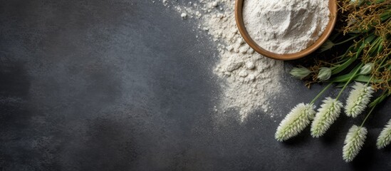 Poster - fresh natural buckwheat flour on a dark stone background culinary concept. copy space available
