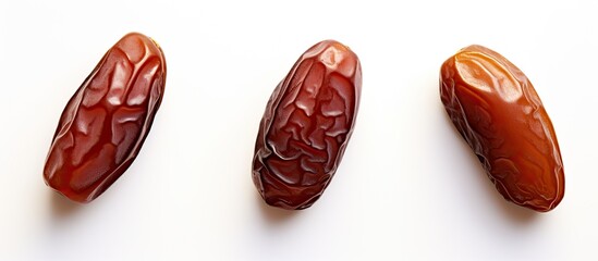 Poster - Top view of three dates on white background. copy space available