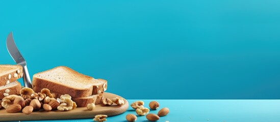 Poster - Make toast with nut paste Two toastes knife and nuts on blue background copy space