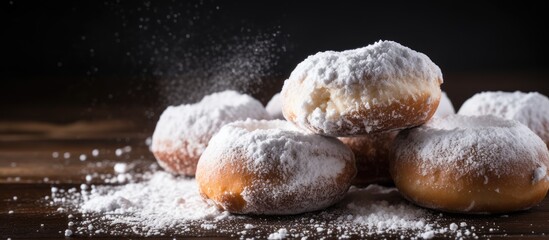 Poster - Sweet donuts with cinnamon sticks powdered with sugar Copy space