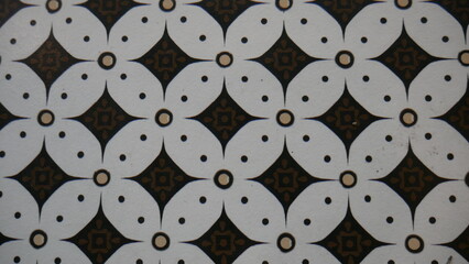 Poster - Textile cloth black and white with a beautiful pattern, cloth design. Texture, background, pattern. The fabric is black and white with a pattern of geometric figures.