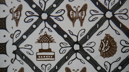 Poster - Texture, background, pattern. Cloth is black and white, with a brown pattern. 