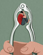 © IKON Images - Teenage boy curled up inside head shaped nutcracker