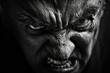 © anatolir - Detailed close-up monochrome portrait of a male's intense and aggressive anger expression. Showcasing the powerful and expressive human features with dramatic wrinkles and fierce eyebrows