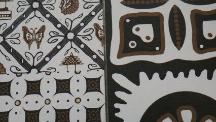 Poster - Fabric silk texture, brown and white with a pattern of circles. Texture, background, pattern. The fabric is black and white with a pattern of geometric figures.