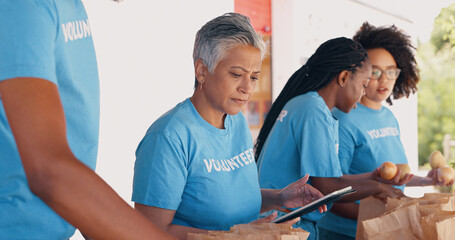 people, volunteering and tablet for food, charity and non profit donation with group, teamwork and m