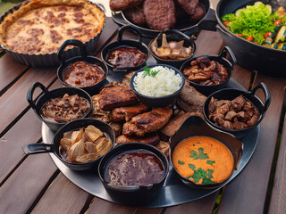Wall Mural - Traditional Hungarian meat dishes with vegetable snacks