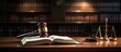© StockKing - In a courtroom or law enforcement office there is an open law book placed on a table alongside a wooden judges gavel The scene is isolated on a white background with enough space for text