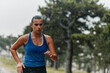 Unstoppable: A Determined Athlete Trains Through the Rain in Pursuit of Marathon Glory