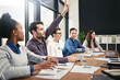 © peopleimages.com - Businessman, team diversity and raising hand for question in boardroom, office and workspace for faq. Businesspeople, meeting and query or point for finances with smile, notebook and collaboration