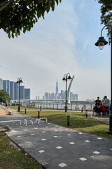 Wall Mural - View of Ho Chi Minh city with blue sky at morning. Financial and business centers in developed Vietnam. View to Bitexco, Landmark 81.