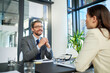 © peopleimages.com - Businessman, meeting and interview with client for b2b, patnership or hiring at office. Business people or intern talking to executive for recruiting, discussion or explaining contract at workplace