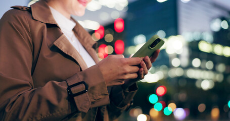 Poster - Woman, hands and outdoor with texting on smartphone on smile at night for conversation on social media in New York. Female person, happy and text message for networking or communication on mobile app