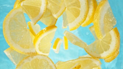 Poster - Freeze Motion of Lemon Slices Falling into Water, Splashing.