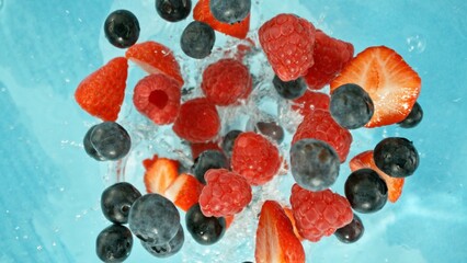 Poster - Freeze Motion of Berries Falling into Water, Splashing.