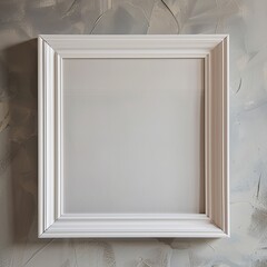 Sticker - A blank white picture frame centered on a textured greyish wall, ready for art or photography