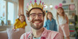 © Oleksandr - cheerful happy adult man wearing princess costume in bright living room, cheerful two girls in background