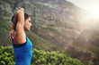 © peopleimages.com - Woman, stretching and runner thinking outdoor on mountain in morning with goals for fitness. Prepare, arms and athlete start workout with healthy mindset in summer challenge and progress in exercise