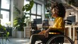 © MP Studio - Professional Woman in Wheelchair at Office