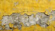 Close up of a distressed yellow and gray wall with peeling paint
