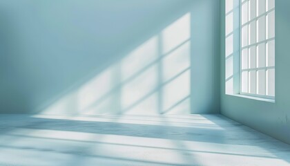 Canvas Print - An empty room with minimal design features casts soft light and shadow patterns through large windows, evoking a sense of calm and simplicity