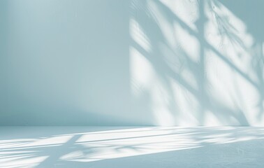 Poster - Minimalistic design of a room with striking natural light creating abstract shadow lines on a plain white wall