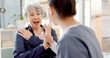 © peopleimages.com - Physiotherapy, shoulder and senior woman consulting, high five and healing with healthcare, wellness and osteoporosis. Chiropractor, arm and old person with rehabilitation, recovery and diagnosis