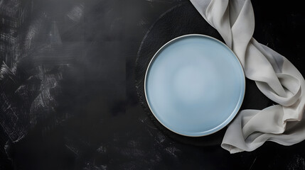 Poster - Blue table cloth with a plate on black chalkboard background Flat lay Top view : Generative AI