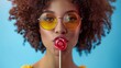 © Vlad Kapusta - Sexy woman with lollipop