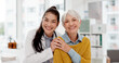 © peopleimages.com - Happy, hug and face of a doctor with a woman for medical trust, healthcare and help. Laughing, care and portrait of a young nurse with a senior patient and love during a consultation at a clinic