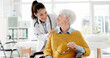 © peopleimages.com - Face, happy or doctor with old woman In wheelchair or consultation for healthcare in hospital clinic. Portrait, smile or medical worker consulting an elderly person with a disability in appointment