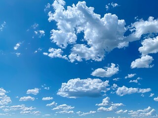 sky is blue with many clouds. the clouds are scattered throughout the sky