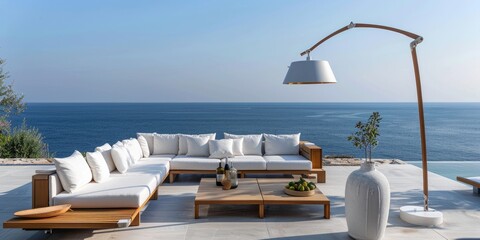 Wall Mural - A wooden sofa with pillows on the terrace of a modern villa overlooking the sea