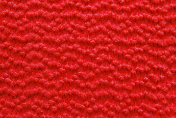 Wall Mural - Red boucle woolen fabric texture as background
