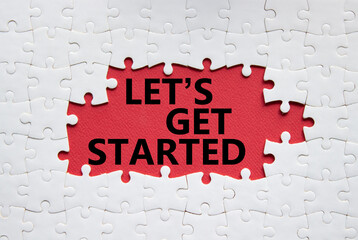 Wall Mural - lets get started symbol. concept words lets get started on white puzzle. beautiful red background. b