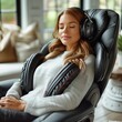 Woman Sitting in Chair With Headphones On