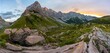 © imageBROKER - Panorama, alpenglow at the Biegenkoepfen and Wolayerkopf, mountain landscape with green meadows and rocky mountain peaks at sunset, Carnic Alps, Carnic High Trail, Carinthia, Austria, Europe