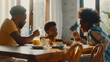 © Generative AI - Cheerful african american parents and children talking while having breakfast at dining table Unaltered family togetherness childhood lifestyle food healthy happy and home concept : Generative AI