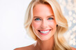 © Deyber Sepulveda - Woman with blonde hair and blue eyes looking at the camera smiling on a white background