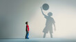 © Generative AI - Dreams about big and famous future Conceptual image with little boy and shadow of male basketball player on light gray background Childhood dreams imagination education concept Looks h : Generative AI