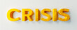 Crisis, yellow volumetric letters, text on a light background