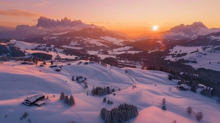 Canvas Print - A beautiful sunset scene over snow-covered mountains. Suitable for various outdoor and nature-themed projects